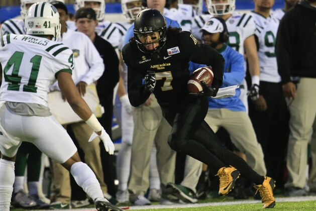 Dec 19, 2015; Montgomery, AL, USA; Appalachian State Mountaineers wide receiver Malachi Jones (7) carries the ball against Ohio Bobcats in the 2015 Camellia Bowl at Cramton Bowl. Mandatory Credit: Marvin Gentry-USA TODAY Sports