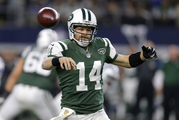 New York Jets quarterback Ryan Fitzpatrick (14) throws a pass against the Dallas Cowboys in the first half of an NFL football game, Saturday, Dec. 19, 2015, in Arlington, Texas. (AP Photo/Brandon Wade)