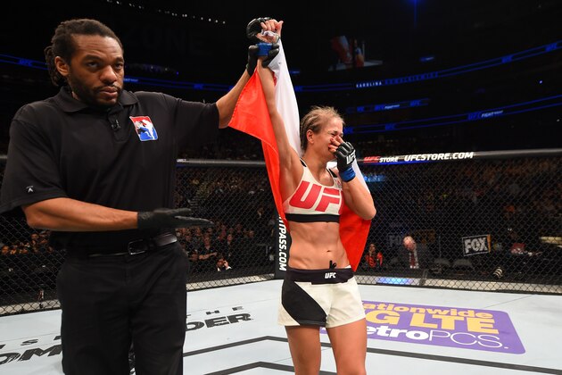 ORLANDO, FL - DECEMBER 19:   Karolina Kowalkiewicz celebrates her victory over Randa Markos in their women's strawweight bout during the UFC Fight Night event at the Amway Center on December 19, 2015 in Orlando, Florida. (Photo by Josh Hedges/Zuffa LLC/Zuffa LLC via Getty Images)