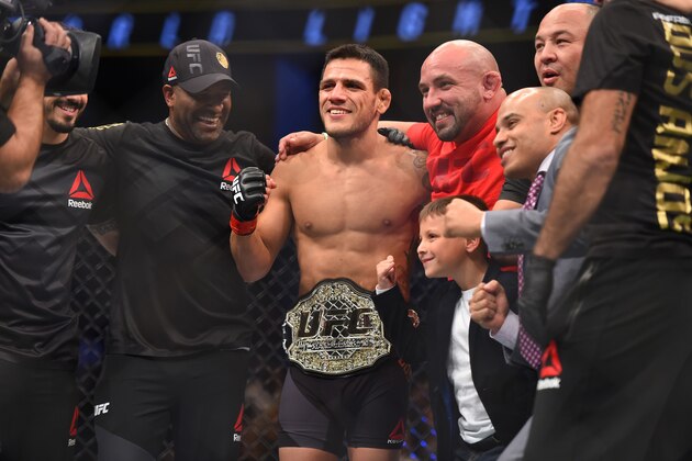 ORLANDO, FL - DECEMBER 19:   Rafael dos Anjos celebrates his TKO victory over Donald Cerrone in their UFC lightweight title bout during the UFC Fight Night event at the Amway Center on December 19, 2015 in Orlando, Florida. (Photo by Jeff Bottari/Zuffa LLC/Zuffa LLC via Getty Images)