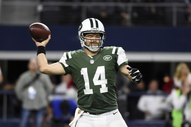 New York Jets quarterback Ryan Fitzpatrick (14) throws a pass late in the second half of an NFL football game against the Dallas Cowboys on Saturday, Dec. 19, 2015, in Arlington, Texas. (AP Photo/Michael Ainsworth)