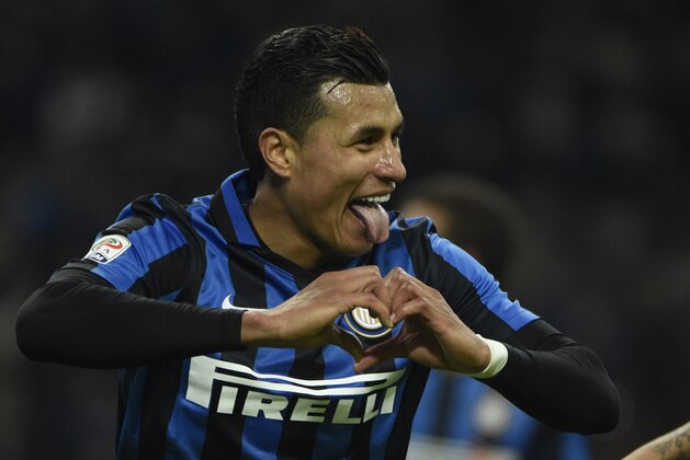 Inter Milan's midfielder Jeison Murillo celebrates after scoring during the Italian Serie A football match Inter Milan vs Frosinone on November 22, 2015 at the San Siro Stadium stadium in Milan. AFP PHOTO / OLIVIER MORIN        (Photo credit should read OLIVIER MORIN/AFP/Getty Images)