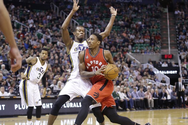 Toronto Raptors guard DeMar DeRozan (10) drives to the basket as Utah Jazz guard Rodney Hood (5) defends in the second half during an NBA basketball game Wednesday, Nov. 18, 2015, in Salt Lake City. Utah won 93-89. (AP Photo/Rick Bowmer)