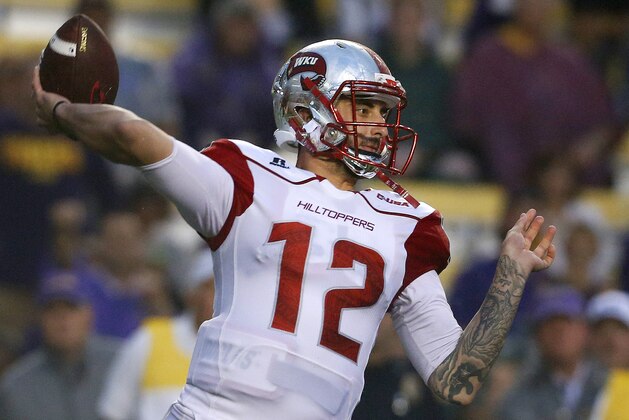 Western Kentucky quarterback Brandon Doughty (12) throws the ball during the first half an NCAA college football game against LSU in Baton Rouge, La., Saturday, Oct. 24, 2015. (AP Photo/Jonathan Bachman)