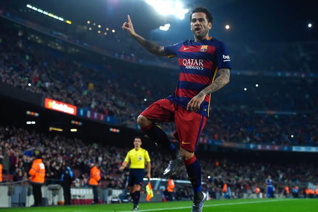 BARCELONA, SPAIN - DECEMBER 02:  Dani Alves of FC Barcelona celebrates after scoring the opening goal during the  Copa del Rey Round of 32 second leg match betwen FC Barcelona and Villanovense on December 2, 2015 in Barcelona, Spain.  (Photo by David Ramos/Getty Images)