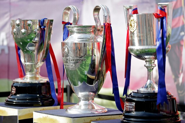 Trophies of FC Barcelona Season 2014-2015 (L-R) La Liga Cup, Champions League, Copa Del Rey during the Joan Gamper Trophy match between Barcelona and AS Roma on August 5, 2015 at the Camp Nou stadium in Barcelona, Spain.(Photo by VI Images via Getty Images)