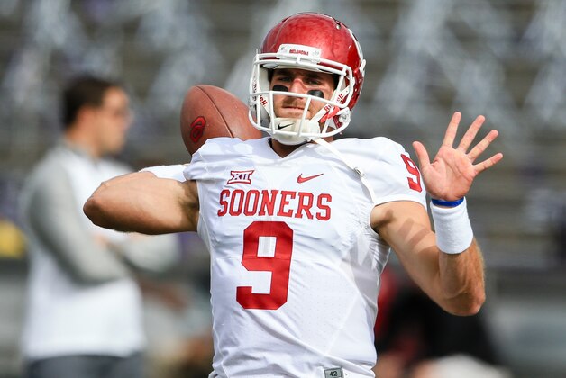 Oklahoma quarterback Trevor Knight (9) warms up before an NCAA college football game against Kansas State in Manhattan, Kan., Saturday, Oct. 17, 2015. (AP Photo/Nati Harnik)
