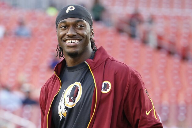 Sep 3, 2015; Landover, MD, USA; Washington Redskins quarterback Robert Griffin III (10) looks on prior to the game against the Jacksonville Jaguars at FedEx Field. Mandatory Credit: Amber Searls-USA TODAY Sports