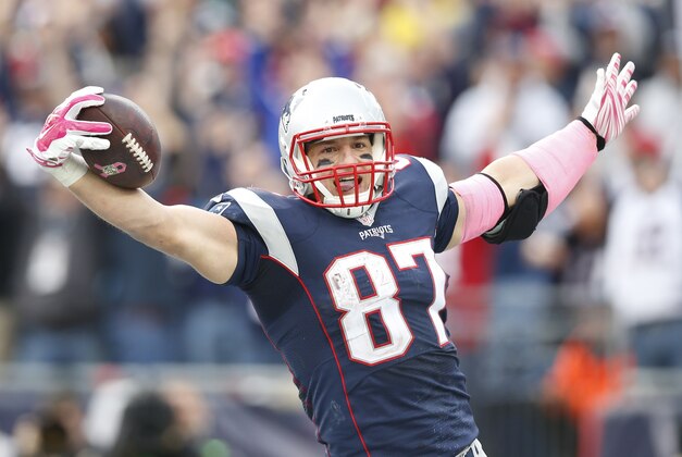 Oct 25, 2015; Foxborough, MA, USA; New England Patriots tight end Rob Gronkowski (87) celebrates after scoring a touchdown during the fourth quarter against the New York Jets at Gillette Stadium. The New England Patriots won 30-23. Mandatory Credit: Greg M. Cooper-USA TODAY Sports Oct 25, 2015; Foxborough, MA, USA; New England Patriots tight end Rob Gronkowski (87) celebrates after scoring a touchdown during the fourth quarter against the New York Jets at Gillette Stadium. The New England Patriots won 30-23. Mandatory Credit: Greg M. Cooper-USA TODAY Sports