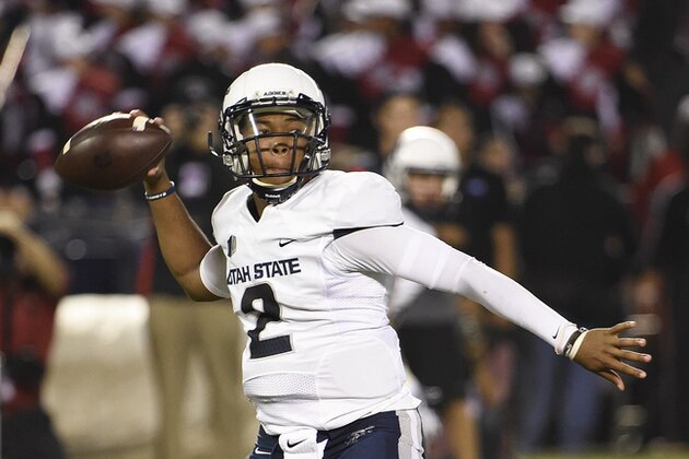 Utah State quarterback Kent Myers (2) throw a pass during the first half of an NCAA college football game against San Diego State, Friday, Oct. 23, 2015 in San Diego.  (AP Photo/Denis Poroy)