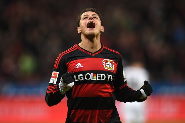 Leverkusen's Mexican striker Javier Hernandez celebrates during the German first division Bundesliga football match Bayer 04 Leverkusen vs Borussia Moenchengladbach in Leverkusen, western Germany, on December 12, 2015. 
AFP PHOTO / PATRIK STOLLARZ

RESTRICTIONS: DURING MATCH TIME: DFL RULES TO LIMIT THE ONLINE USAGE TO 15 PICTURES PER MATCH AND FORBID IMAGE SEQUENCES TO SIMULATE VIDEO. == RESTRICTED TO EDITORIAL USE == FOR FURTHER QUERIES PLEASE CONTACT DFL DIRECTLY AT + 49 69 650050. / AFP / PATRIK STOLLARZ        (Photo credit should read PATRIK STOLLARZ/AFP/Getty Images)