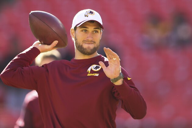 Washington Redskins quarterback Kirk Cousins (8) warms up before an NFL football game against the Buffalo Bills in Landover, Md., Sunday, Dec. 20, 2015. (AP Photo/Andrew Harnik)