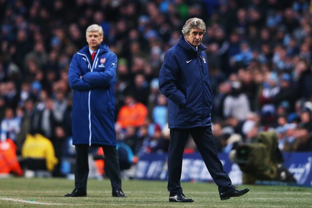MANCHESTER, ENGLAND - JANUARY 18:  Manuel Pellegrini manager of Manchester City and Arsene Wenger manager of Arsenal look on from the touchline during the Barclays Premier League match between Manchester City and Arsenal at Etihad Stadium on January 18, 2015 in Manchester, England.  (Photo by Alex Livesey/Getty Images)