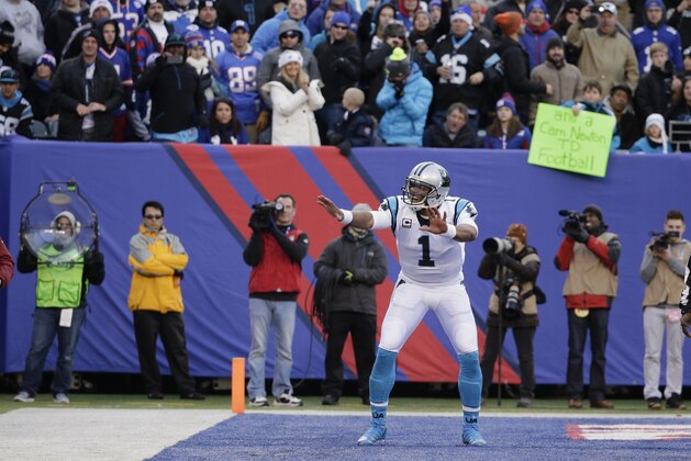 Carolina Panthers quarterback Cam Newton (1) celebrates after throwing a touchdown during the second half of an NFL football game against the New York Giants Sunday, Dec. 20, 2015, in East Rutherford, N.J. (AP Photo/Julie Jacobson)