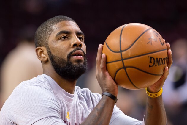 CLEVELAND, OH - DECEMBER 20: Kyrie Irving #2 of the Cleveland Cavaliers warms up prior to the game against the Philadelphia 76ers during the first half at Quicken Loans Arena on December 20, 2015 in Cleveland, Ohio.  NOTE TO USER: User expressly acknowledges and agrees that, by downloading and/or using this photograph, user is consenting to the terms and conditions of the Getty Images License Agreement. Mandatory copyright notice(Photo by Jason Miller/Getty Images)