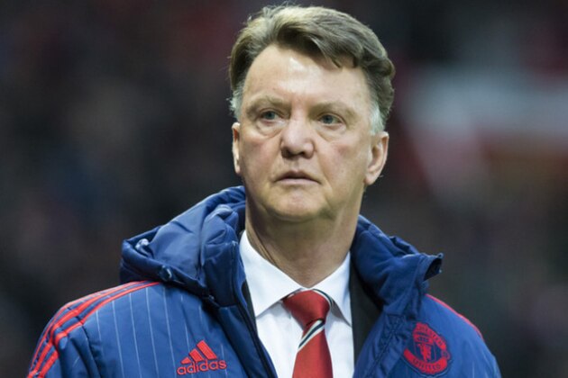 Manchester United's new manager Louis van Gaal takes to the touchline before his team's English Premier League soccer match between Manchester United and Norwich City at Old Trafford Stadium, Manchester, England, Saturday, Dec. 19, 2015. (AP Photo/Jon Super)