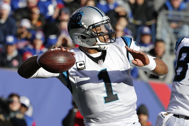 Carolina Panthers quarterback Cam Newton (1) throws a pass during the first half of an NFL football game against the New York Giants Sunday, Dec. 20, 2015, in East Rutherford, N.J. (AP Photo/Kathy Willens)