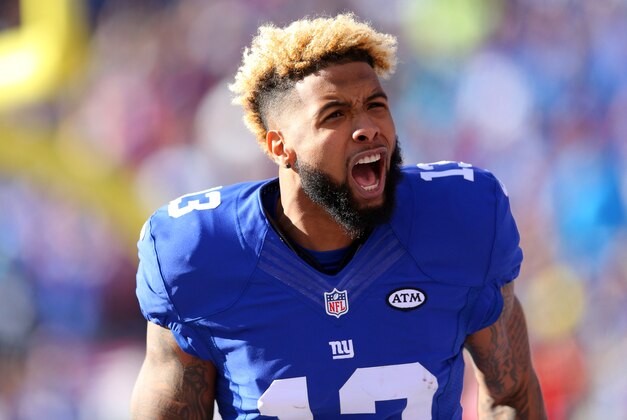 Dec 20, 2015; East Rutherford, NJ, USA; New York Giants wide receiver Odell Beckham Jr. (13) yells to the fans before a game against the Carolina Panthers at MetLife Stadium. Mandatory Credit: Brad Penner-USA TODAY Sports