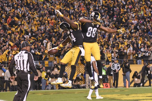 Pittsburgh Steelers wide receiver Antonio Brown (84) celebrate with wide receiver Darrius Heyward-Bey (88) after making a touchdown catch in the second half of an NFL football game against the Denver Broncos, Sunday, Dec. 20, 2015, in Pittsburgh. (AP Photo/Don Wright)