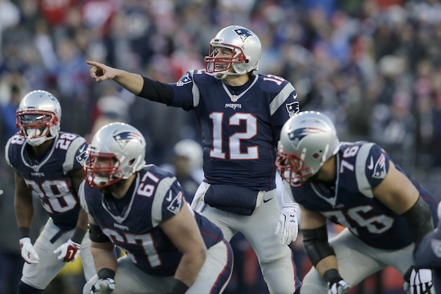 New England Patriots quarterback Tom Brady (12) calls signals at the line against the Tennessee Titans in the second half of an NFL football game, Sunday, Dec. 20, 2015, in Foxborough, Mass. (AP Photo/Charles Krupa)