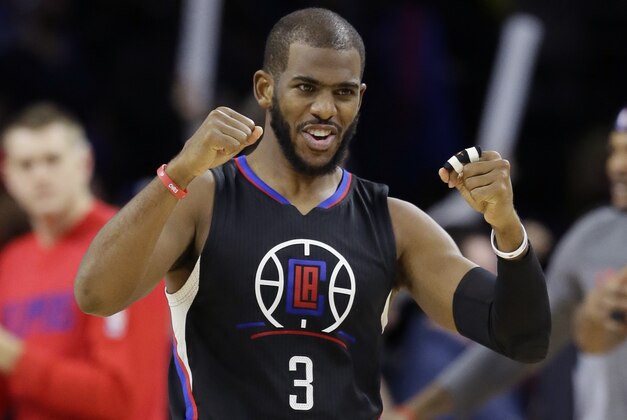 Los Angeles Clippers guard Chris Paul reacts after the Clippers defeated the Detroit Pistons 105-103 in overtime of an NBA basketball game, Monday, Dec. 14, 2015, in Auburn Hills, Mich. (AP Photo/Carlos Osorio)