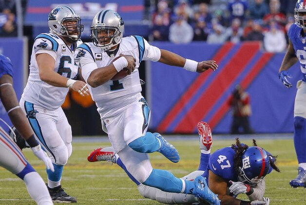 Dec 20, 2015; East Rutherford, NJ, USA;  Carolina Panthers quarterback Cam Newton (1) runs after breaking tackle by New York Giants middle linebacker Uani' Unga (47) during the fourth quarter at MetLife Stadium. Carolina Panthers defeat the New York Giants 38-35. Mandatory Credit: Jim O'Connor-USA TODAY Sports