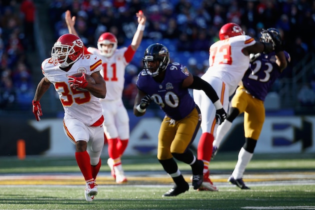 BALTIMORE, MD - DECEMBER 20:  Quarterback Alex Smith #11 celebrates as running back Charcandrick West #35 of the Kansas City Chiefs rushes for a first quarter touchdown against the Baltimore Ravens at M&T Bank Stadium on December 20, 2015 in Baltimore, Maryland.  (Photo by Rob Carr/Getty Images)