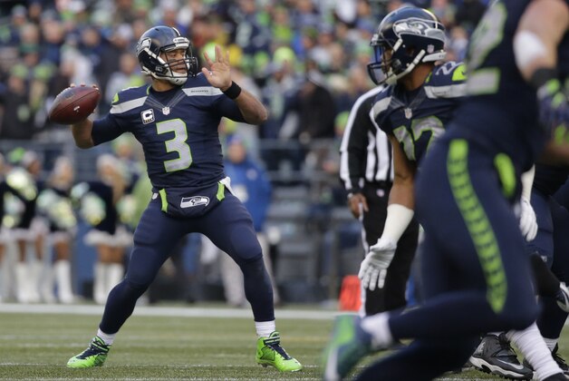 Seattle Seahawks quarterback Russell Wilson passes against the Cleveland Browns in the second half of an NFL football game, Sunday, Dec. 20, 2015, in Seattle. (AP Photo/Ted S. Warren)