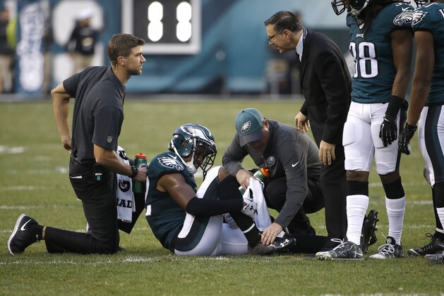 Philadelphia Eagles' Eric Rowe sits on the field after an injury during the second half of an NFL football game against the Buffalo Bills, Sunday, Dec. 13, 2015, in Philadelphia. (AP Photo/Matt Rourke)