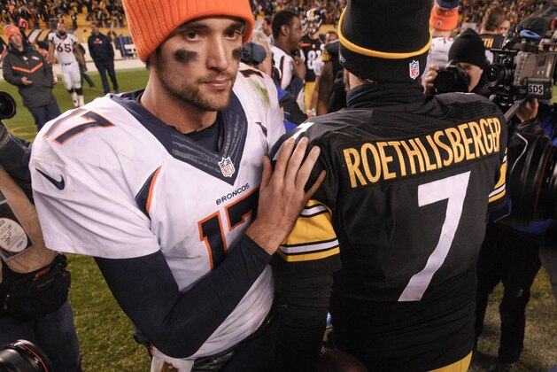 Pittsburgh Steelers quarterback Ben Roethlisberger (7) and Denver Broncos quarterback Brock Osweiler (17) meet after an NFL football game, Sunday, Dec. 20, 2015, in Pittsburgh. The Steelers won 34-27. (AP Photo/Don Wright)
