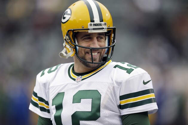 Green Bay Packers quarterback Aaron Rodgers warms up before an NFL football game against the Oakland Raiders Sunday, Dec. 20, 2015, in Oakland, Calif. (AP Photo/Ben Margot)