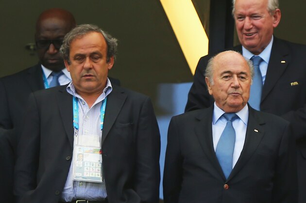 SALVADOR, BRAZIL - JUNE 16:  UEFA President Michel Platini (L) and FIFA President Joseph Blatter look on during the 2014 FIFA World Cup Brazil Group G match between Germany and Portugal at Arena Fonte Nova on June 16, 2014 in Salvador, Brazil.  (Photo by Martin Rose/Getty Images)