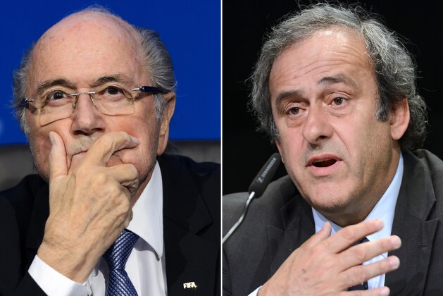 This combination made on October 29, 2015 shows a picture of FIFA president Sepp Blatter (L) taken on July 20, 2015 in Zurich and a picture of UEFA President Michel Platini taken on May 28, 2015 in Zurich. Platini insisted on October 29, 2015 that he remains the best man to lead scandal-hit FIFA despite currently being suspended from the sport. Blatter has claimed there was a deal to give Russia the 2018 World Cup before voting took place, and blamed 'bad losers' England and the US for the corruption scandal engulfing the organisation.  / AFP / FABRICE COFFRINI        (Photo credit should read FABRICE COFFRINI/AFP/Getty Images)