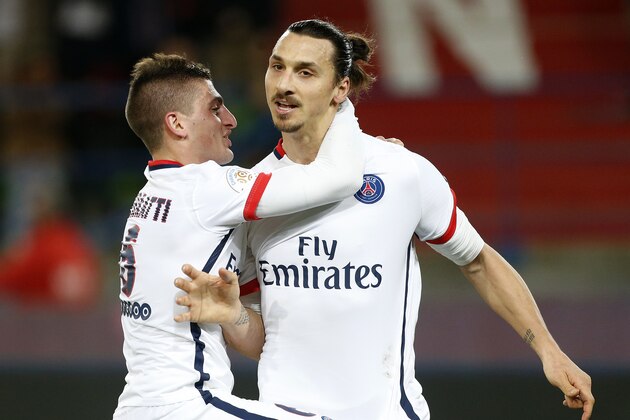 CAEN, FRANCE - DECEMBER 19: Zlatan Ibrahimovic of PSG celebrates his goal with Marco Verratti (left) during the French Ligue 1 match between Stade Malherbe de Caen and Paris Saint-Germain (PSG) Stade Michel D'Ornano on December 19, 2015 in Caen, France. (Photo by Jean Catuffe/Getty Images)