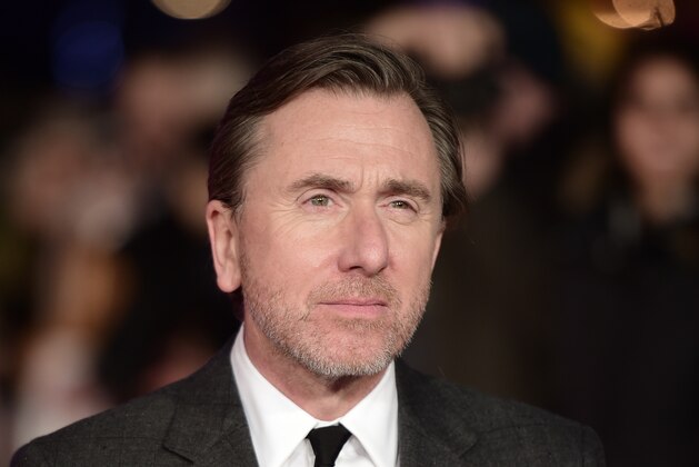 British actor Tim Roth poses on the red carpet of the European premiere of film 'The Hateful Eight' in London on December 10, 2015.  AFP PHOTO / LEON NEAL / AFP / LEON NEAL        (Photo credit should read LEON NEAL/AFP/Getty Images)