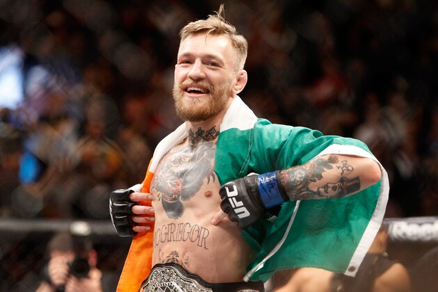 LAS VEGAS, NV - DECEMBER 12:  Conor McGregor celebrates after a first-round knockout victory over Jose Aldo in their featherweight title fight during UFC 194 on December 12, 2015 in Las Vegas, Nevada.  (Photo by Steve Marcus/Getty Images)
