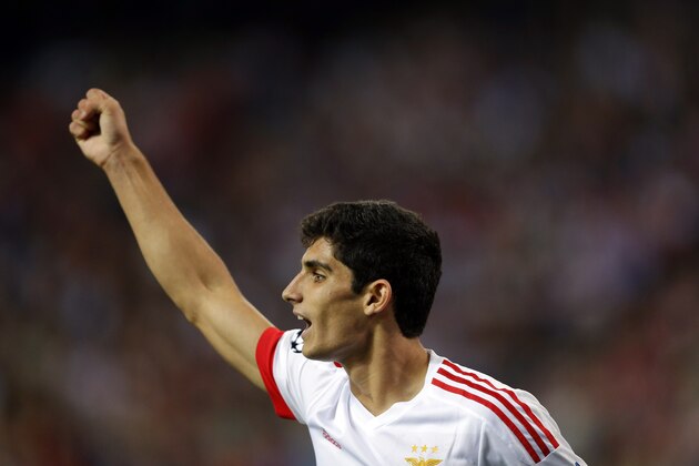 Benfica's Goncalo Guedes celebrates after scoring the second goal of his team during the Champions League group C soccer match between Atletico de Madrid and Benfica at the Vicente Calderon stadium in Madrid, Wednesday, Sept. 30, 2015. (AP Photo/Daniel Ochoa de Olza)