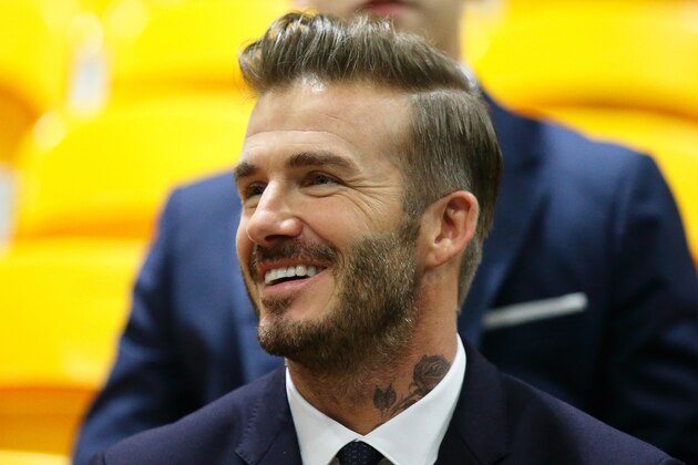 SINGAPORE - DECEMBER 06:  English former professional footballer, David Beckham watches the Men's Team Football 5-a-Side match between Singapore and Thailand during the 8th ASEAN Para Games 2015 at the Marina Bay Sands Hall on December 6, 2015 in Singapore.  (Photo by Suhaimi Abdullah/Getty Images)