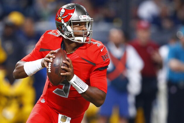 Tampa Bay Buccaneers quarterback Jameis Winston drops back to pass during the first quarter of an NFL football game against the St. Louis Rams on Thursday, Dec. 17, 2015, in St. Louis. (AP Photo/Billy Hurst)