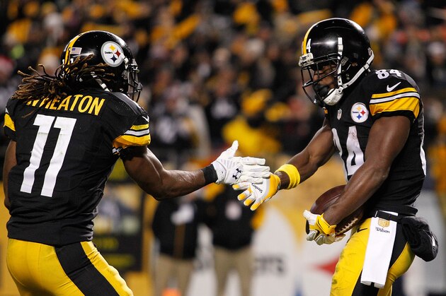PITTSBURGH, PA - DECEMBER 20: Markus Wheaton #11 of the Pittsburgh Steelers and Antonio Brown #84 of the Pittsburgh Steelers celebrate Brown's fourth quarter touchdown during the game against the Denver Broncos at Heinz Field on December 20, 2015 in Pittsburgh, Pennsylvania. (Photo by Justin Aller/Getty Images)