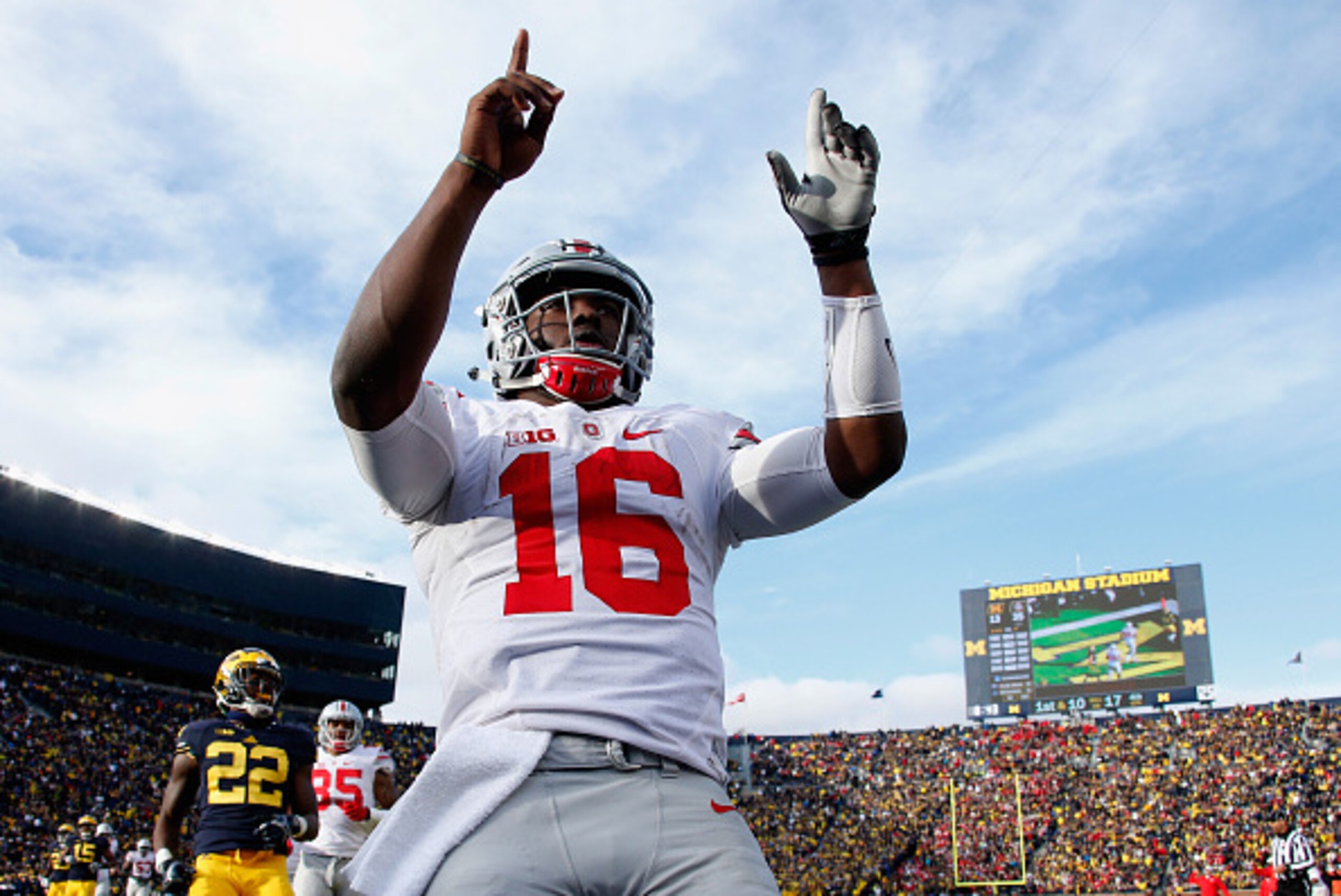ANN ARBOR, MI - NOVEMBER 28:  Quarterback J.T. Barrett #16 of the Ohio State Buckeyes celebrates after rushing for a fourth quarter touchdown against the Michigan Wolverines at Michigan Stadium on November 28, 2015 in Ann Arbor, Michigan.  (Photo by Gregory Shamus/Getty Images)