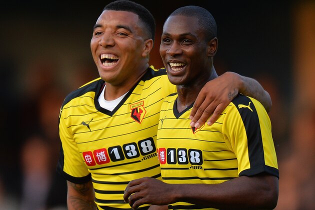 ST ALBANS, ENGLAND - JULY 08:  Odion Ighalo of Watford celebrates with Troy Deeney after scoring their second goal during the Pre Season Friendly match between St Albans City and Watford at Clarence Park on July 8, 2015 in St Albans, England.  (Photo by Tony Marshall/Getty Images)