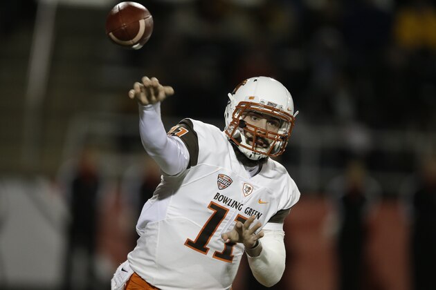 Bowling Green's Matt Johnson (11) throws during the first half of an NCAA college football game against Ball State, Tuesday, Nov. 24, 2015, in Muncie, Ind. (AP Photo/Darron Cummings)
