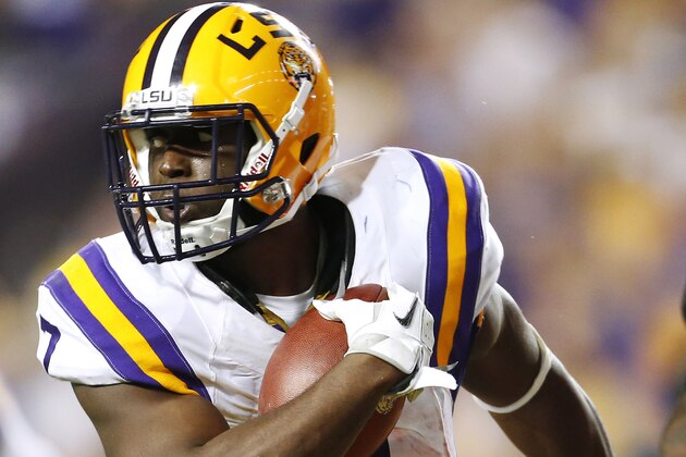 LSU running back Leonard Fournette (7) runs with the ball during the first half an NCAA college football game against Texas A&M in Baton Rouge, La., Saturday, Nov. 28, 2015. (AP Photo/Jonathan Bachman)