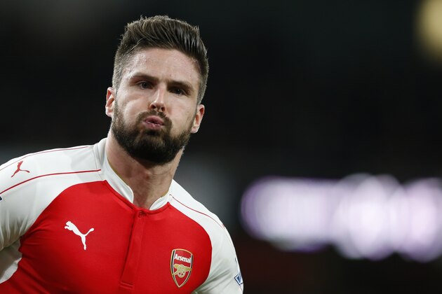 Arsenal's Olivier Giroud celebrates after scoring his side's second goal of the game during the English Premier League soccer match between Arsenal and Manchester City at the Emirates stadium in London, Monday, Dec. 21, 2015. (AP Photo/Alastair Grant)