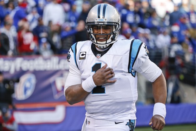 Carolina Panthers quarterback Cam Newton (1) reacts to pain during the first half of an NFL football game against the New York Giants Sunday, Dec. 20, 2015, in East Rutherford, N.J. (AP Photo/Kathy Willens)