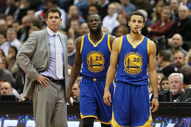 MINNEAPOLIS, MN -  NOVEMBER 12:  Luke Walton, Draymond Green #23 and Stephen Curry #30 of the Golden State Warriors are seen against the Minnesota Timberwolves on November 12, 2015 at Target Center in Minneapolis, Minnesota. NOTE TO USER: User expressly acknowledges and agrees that, by downloading and or using this Photograph, user is consenting to the terms and conditions of the Getty Images License Agreement. Mandatory Copyright Notice: Copyright 2015 NBAE (Photo by Jordan Johnson/NBAE via Getty Images)