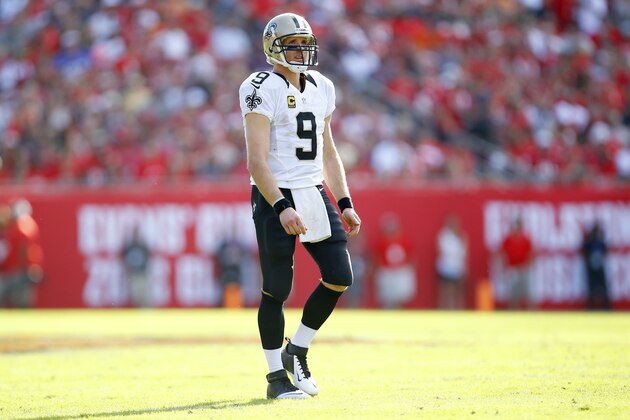 New Orleans Saints quarterback Drew Brees (9) walks up the field the Tampa Bay Buccaneers during an NFL football game Sunday, Dec. 13, 2015, in Tampa, Fla.  (Jeff Haynes/AP Images for Panini)