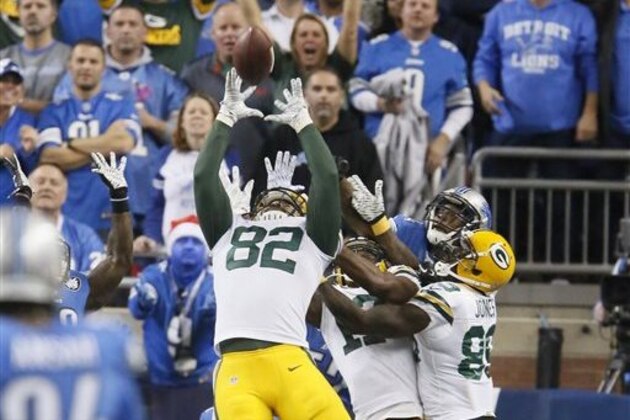 FILE - In this Dec. 3, 2015 file photo, Green Bay Packers tight end Richard Rodgers (82) reaches to catch the game winning pass on the last play of an NFL football game against the Detroit Lions,  in Detroit. There are few veterans better for a young tight end to study on the field than Dallas' Jason Witten. Packers second-year player Rodgers gets to see him up close on Sunday, Dec. 13. (AP Photo/Duane Burleson, File)
