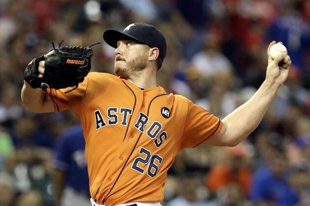 Houston Astros' Scott Kazmir delivers a pitch against the Texas Rangers in the first inning of a baseball game Friday, Sept. 25, 2015, in Houston. (AP Photo/Pat Sullivan)